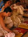 Jain worshippers make tiny mandala-like images from rice grains.